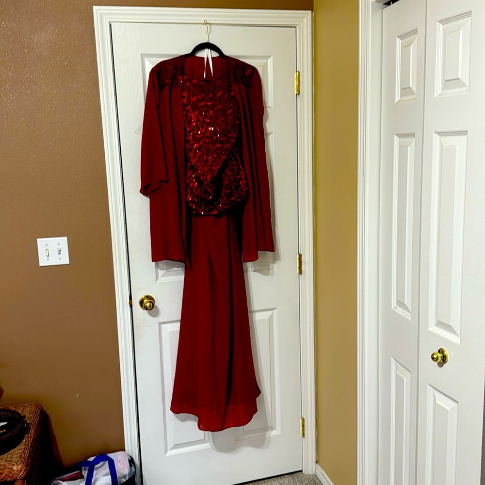 Two-piece size 18 dark burnt orange formal gown with overlay floral top
